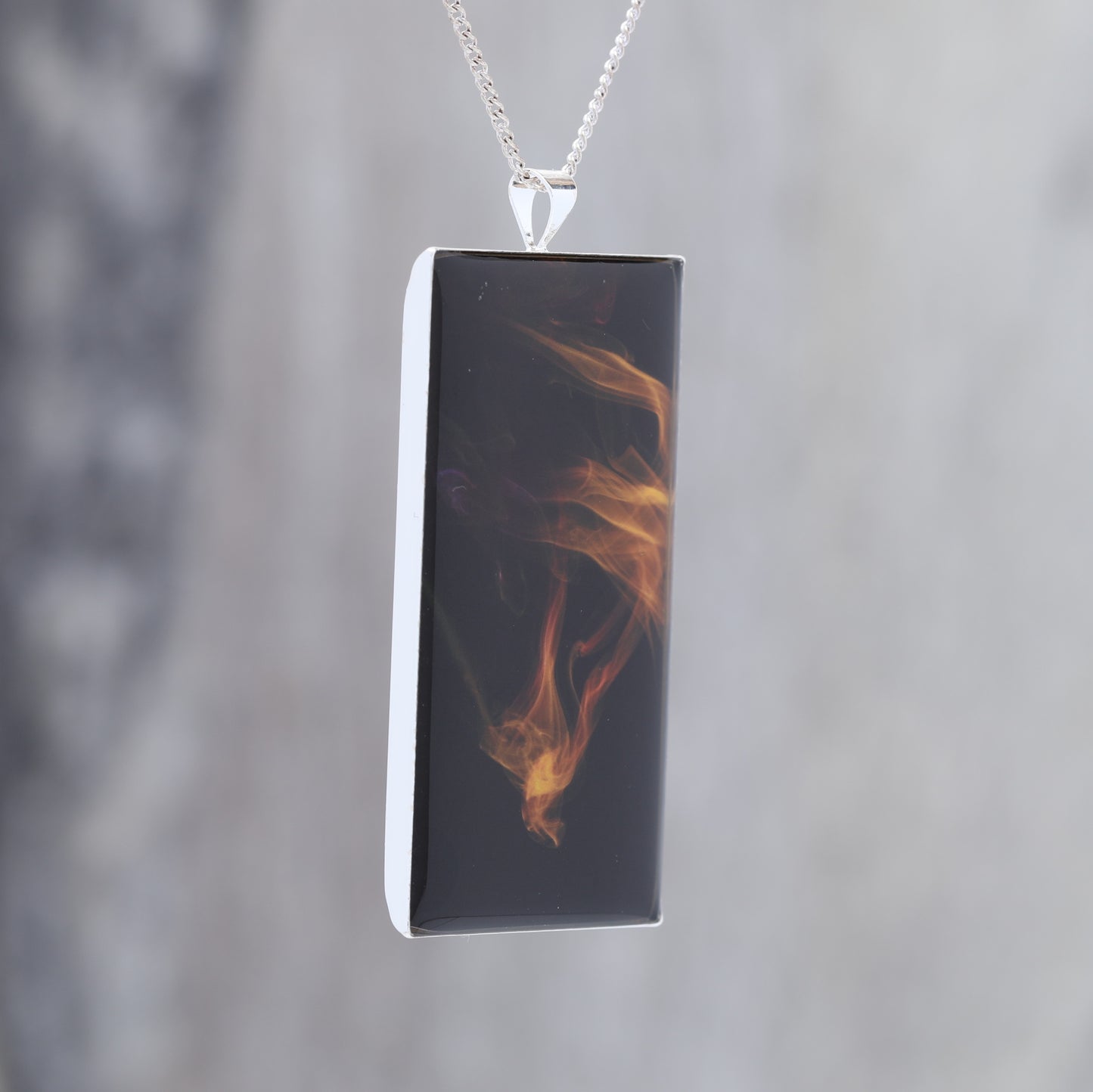 Phoenix Diving! Glow in the dark pendant featuring coloured smoke -  Beautiful abstract image showing science  of air patterns