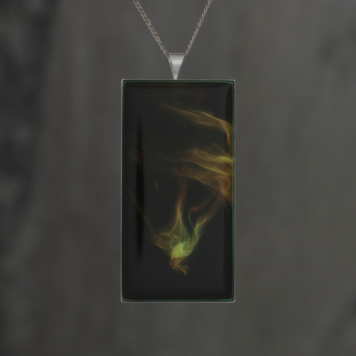 Phoenix Diving! Glow in the dark pendant featuring coloured smoke -  Beautiful abstract image showing science  of air patterns