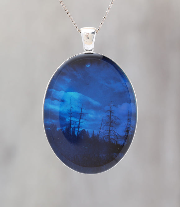 Blue Sky At Night  - Glow-in-the-dark pendant with the Orion Nebula