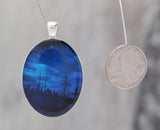 Blue Sky At Night  - Glow-in-the-dark pendant with the Orion Nebula