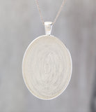 Blue Sky At Night  - Glow-in-the-dark pendant with the Orion Nebula