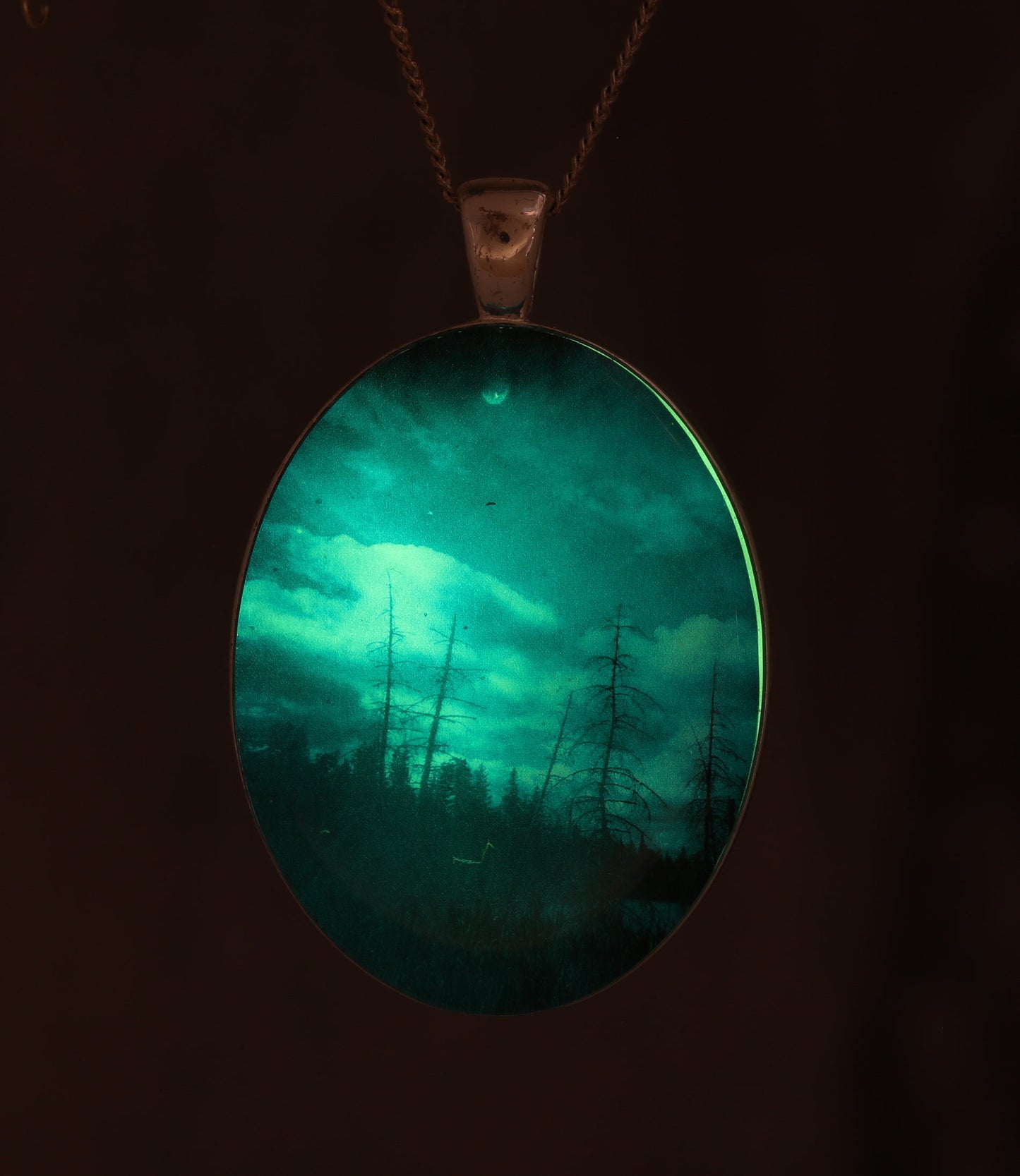 Blue Sky At Night  - Glow-in-the-dark pendant with the Orion Nebula
