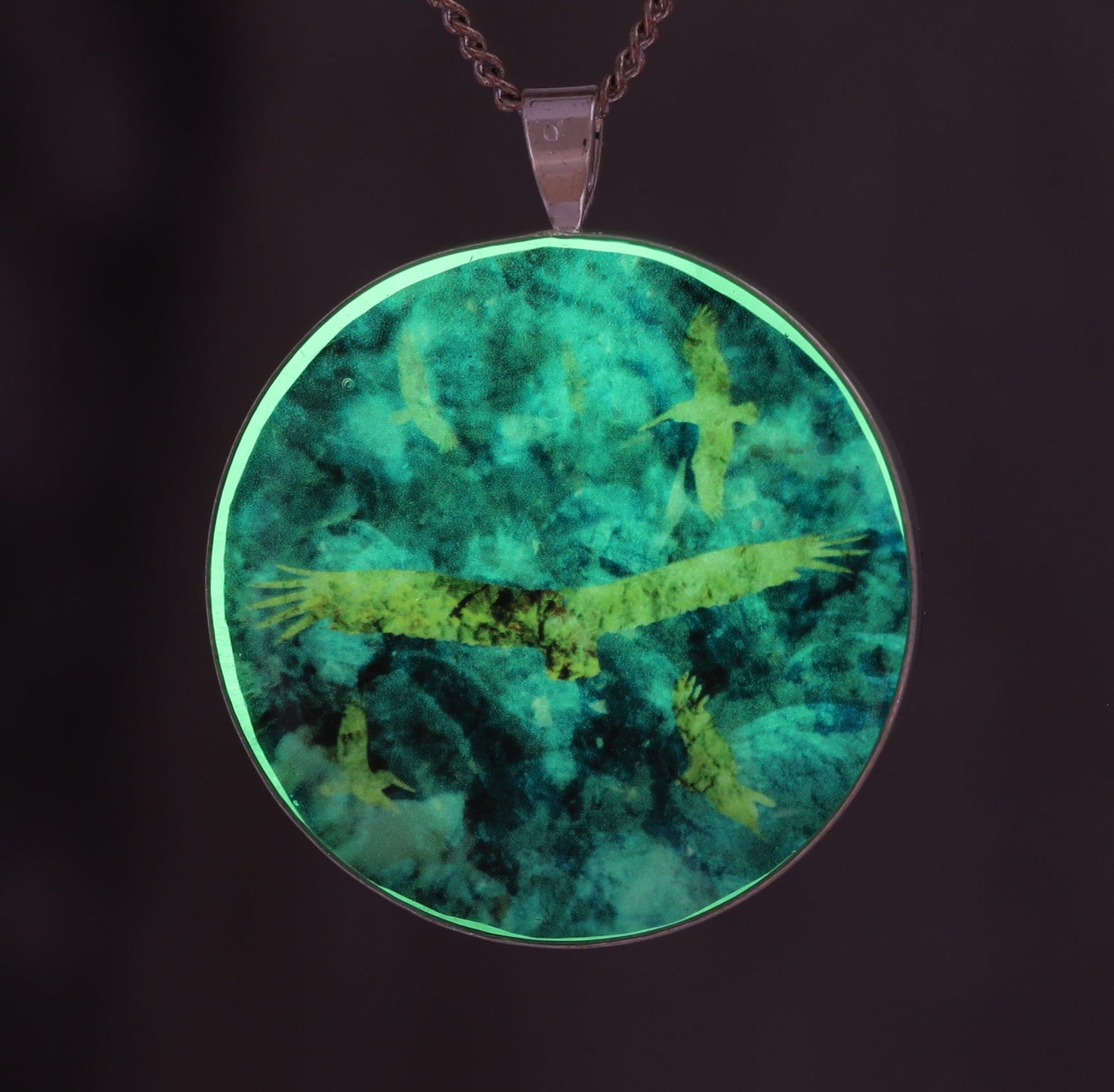 Flying by the Seaside  - Glow-in-the-dark pendant with a beautiful abstract bird pattern