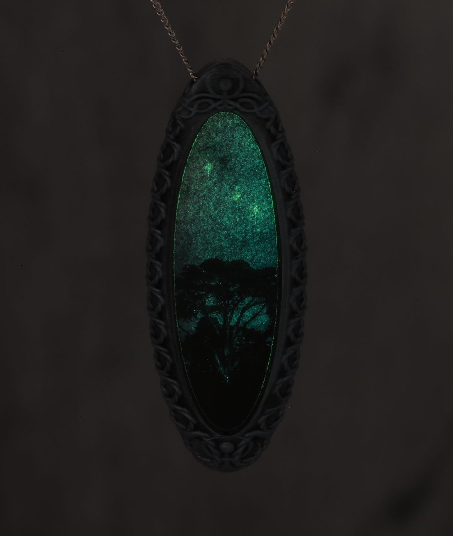 Trees Dreaming - Galaxy Pendant with Celtic Knotwork  and made with a photo of a tree and the Carina Nebula!