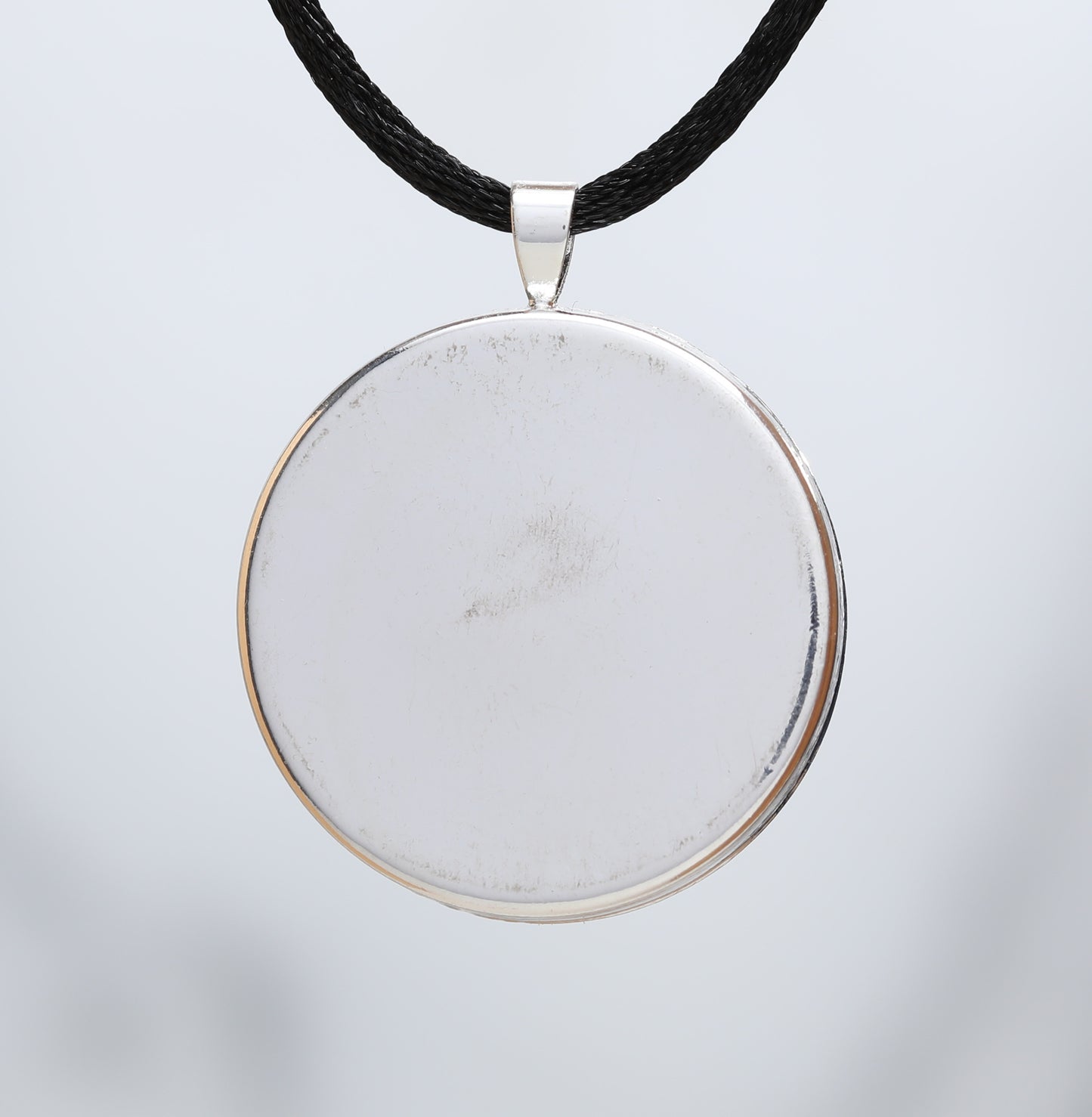 Dancing in Circles  - Glow-in-the-dark pendant with a beautiful abstract soap film pattern